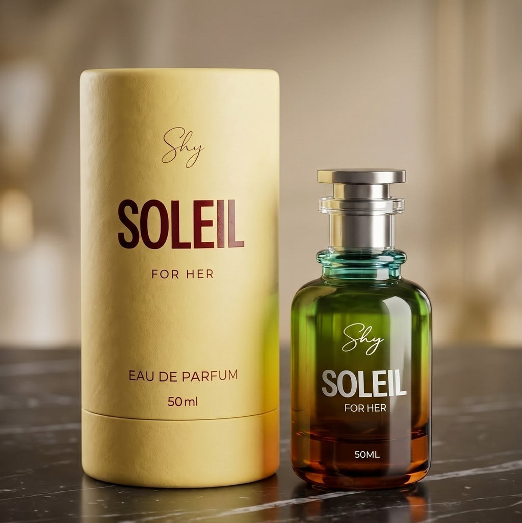 Shy Soleil perfume bottle and packaging on a reflective surface with a blurred background